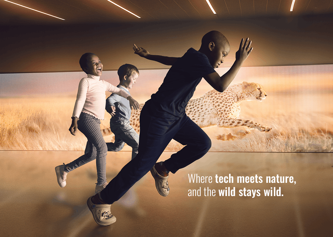 A field team prepares a custom underwater 360° camera rig on a research vessel before deploying it at sea.